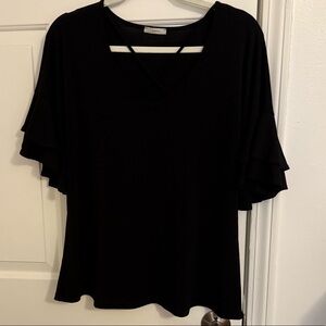 Black top with ruffle sleeves and criss-cross in front, Size M